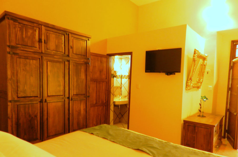 Hotel Collection O Al Otro Lado Del Rio, Puebla Zewnętrze zdjęcie A room at the hotel