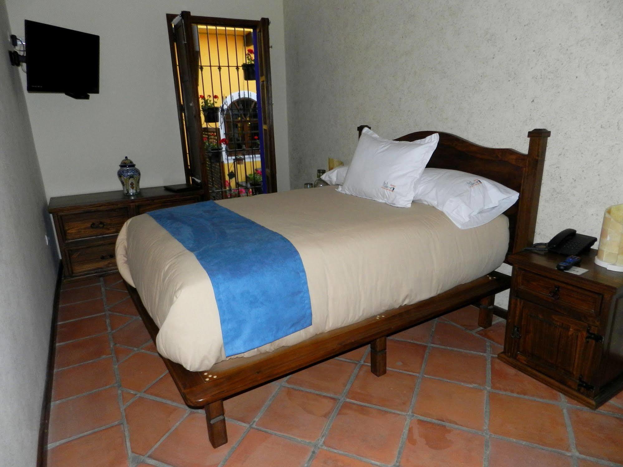 Hotel Collection O Al Otro Lado Del Rio, Puebla Zewnętrze zdjęcie A room at Hotel San Cristóbal