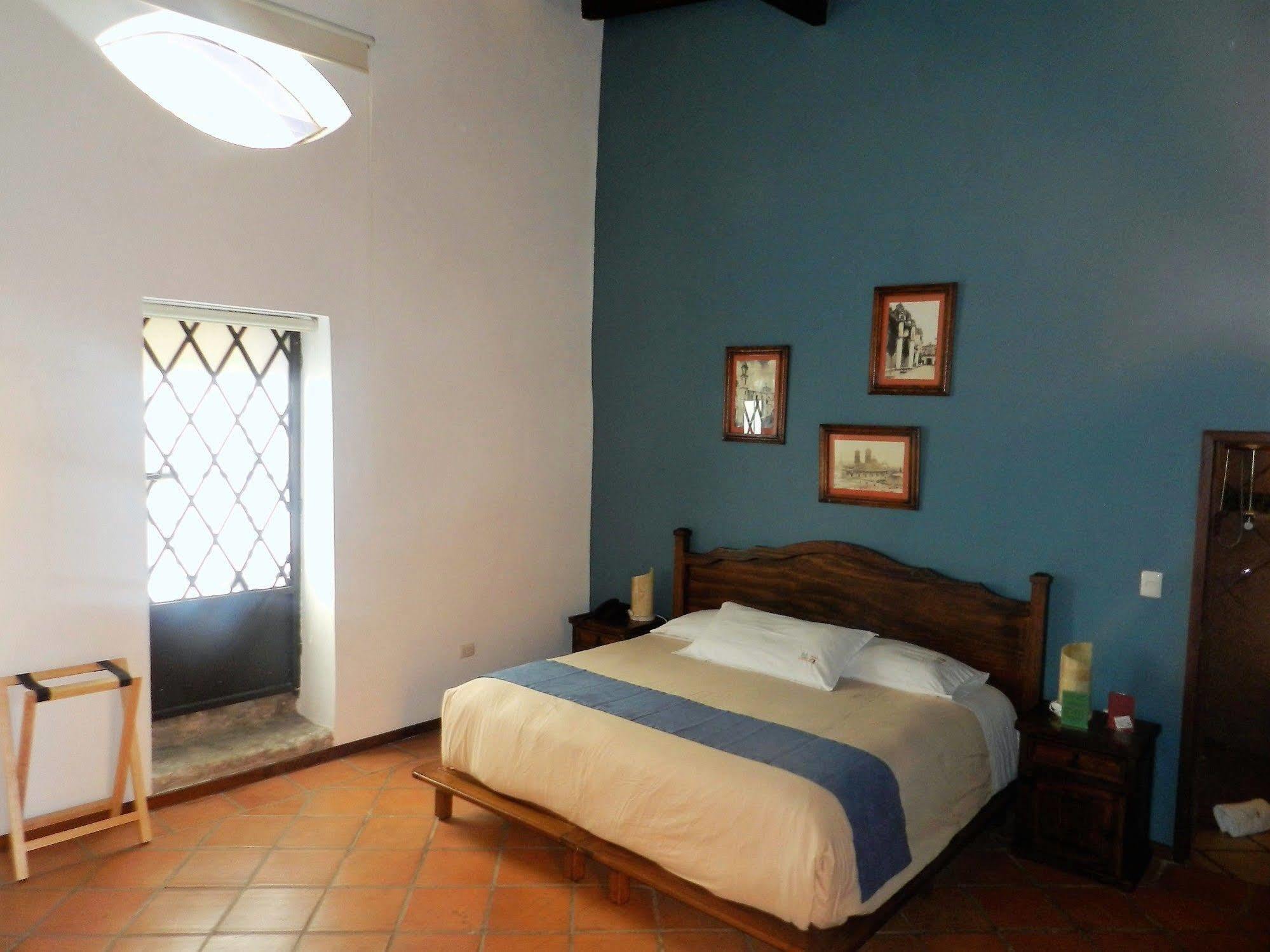 Hotel Collection O Al Otro Lado Del Rio, Puebla Zewnętrze zdjęcie A room at Hotel San Cristóbal