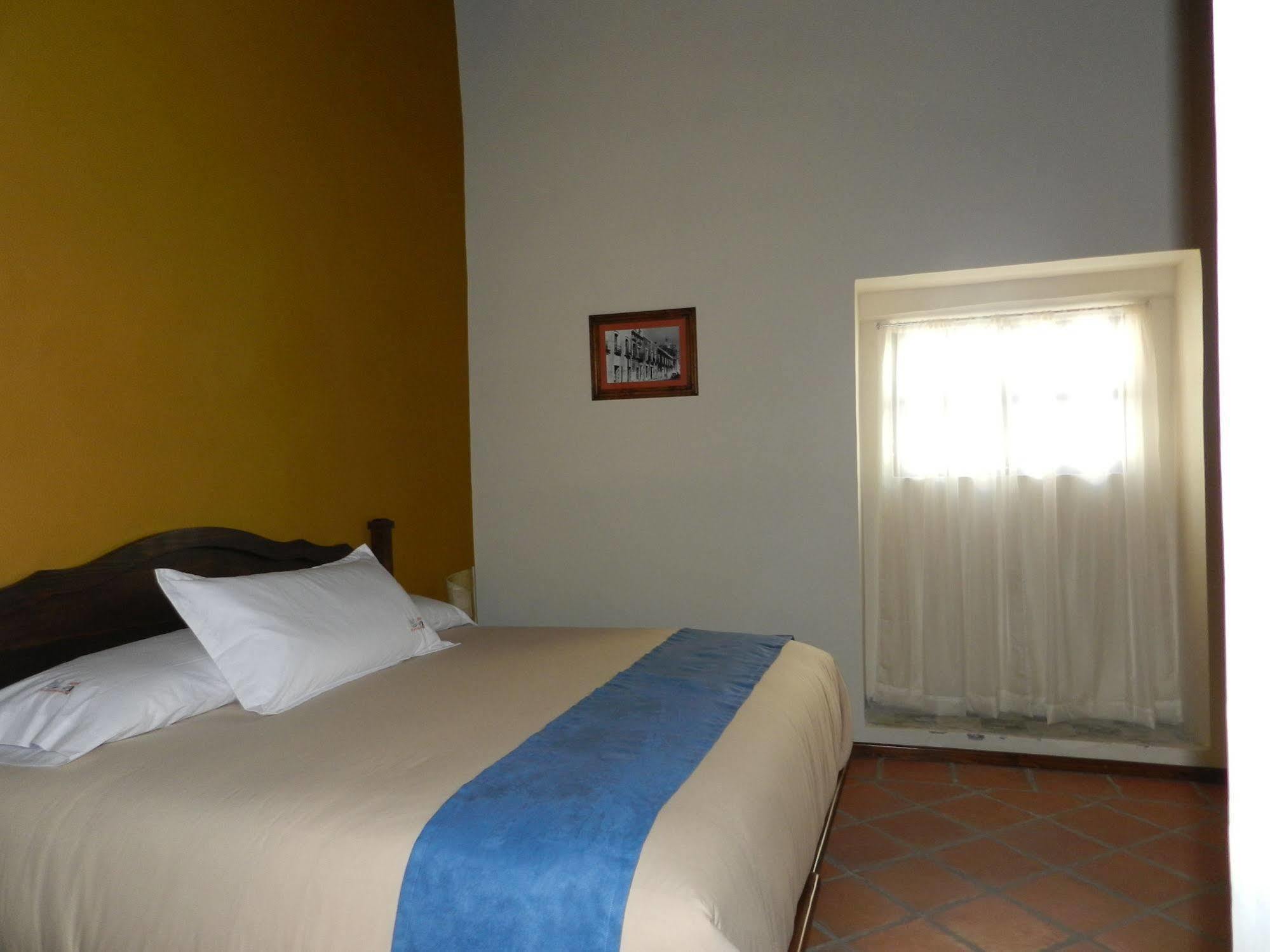 Hotel Collection O Al Otro Lado Del Rio, Puebla Zewnętrze zdjęcie A room at the hotel