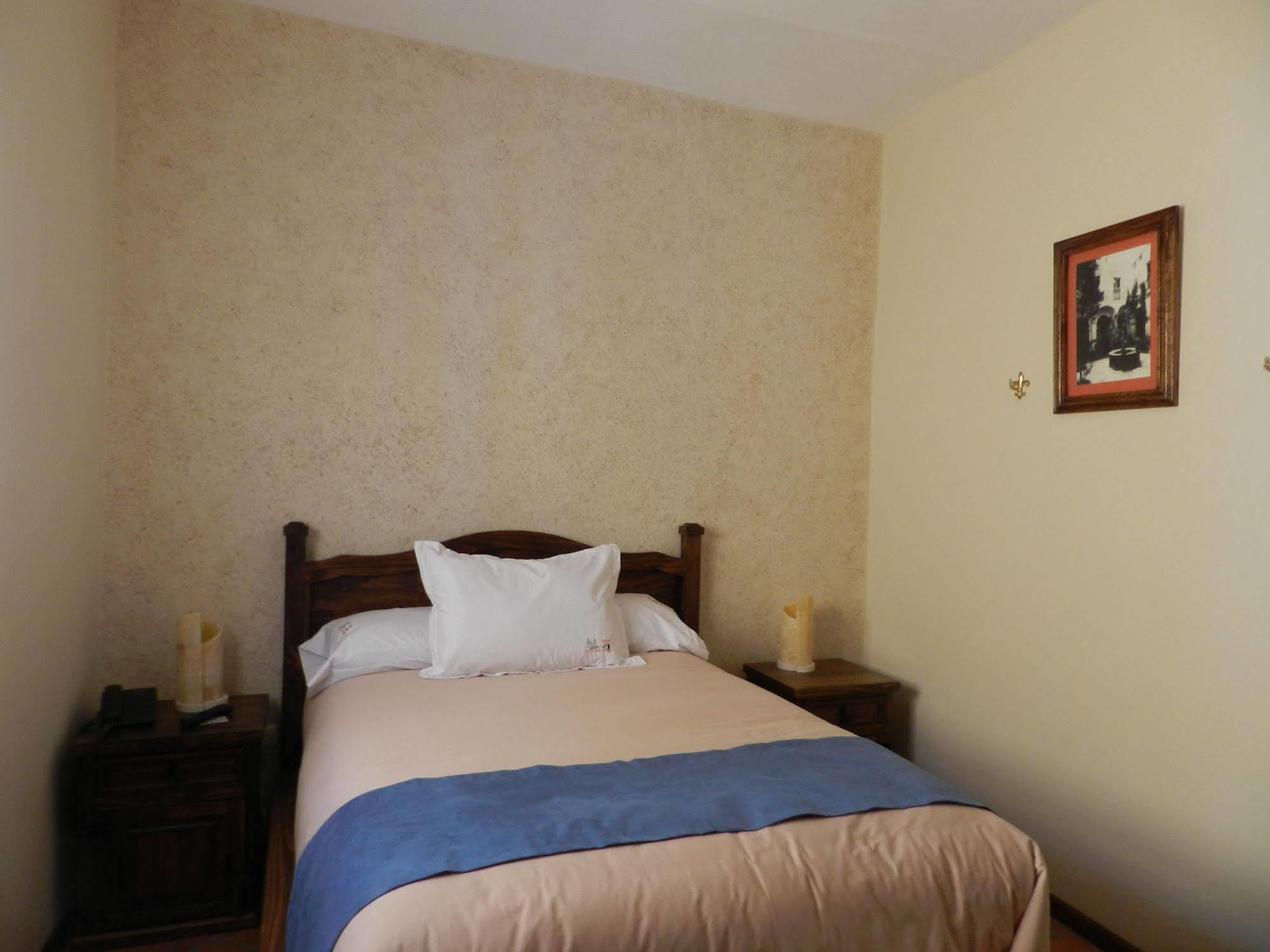 Hotel Collection O Al Otro Lado Del Rio, Puebla Zewnętrze zdjęcie A bedroom at the hotel